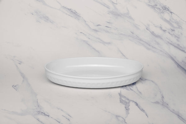 Ariane 10'' x 6 1/2'' Slow Fast - Warm White Porcelain Oval Caserole Deep Bowl - 3/Case (AOTARN000089026) - iFoodservice Online