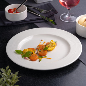 Ariane Prime 10 5/8" White Eclipse Porcelain Flat Plate - 12/Case (APRARN120011027) - iFoodservice Online