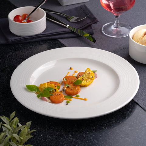 Ariane Prime 10 5/8" White Eclipse Porcelain Flat Plate - 12/Case (APRARN120011027) - iFoodservice Online