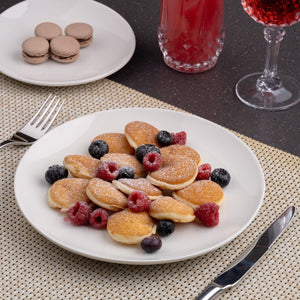 Ariane Vital Coupe 10 5/8" Vital Coupe - Warm White Porcelain Coupe Round Rimless Plate - 6/Case (AVCARN000011027) - iFoodservice Online