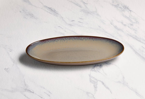 Ariane Vital Coupe 12 3/5" Splash Beige Porcelain Coupe Oval Plate - 6/Case (AVCARN257015032) - iFoodservice Online