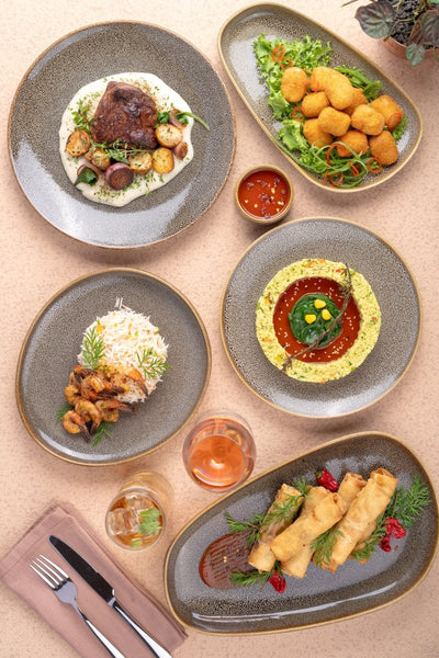 Ariane Vital Coupe 7" Freckles Porcelain Coupe Round Deep Plate - 6/Case (AVCARNC97012018) - iFoodservice Online