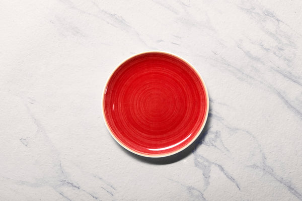 Ariane Vital Coupe 7" Twister Red Porcelain Coupe Round Rimless Plate - 12/Case (AVCARN204011018) - iFoodservice Online