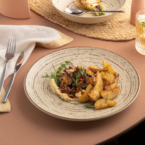 Ariane Vital Coupe 9 4/9" Tornado - Sand Dollar Gray Porcelain Coupe Round Rimless Plate - 6/Case (AVCARN428011024) - iFoodservice Online